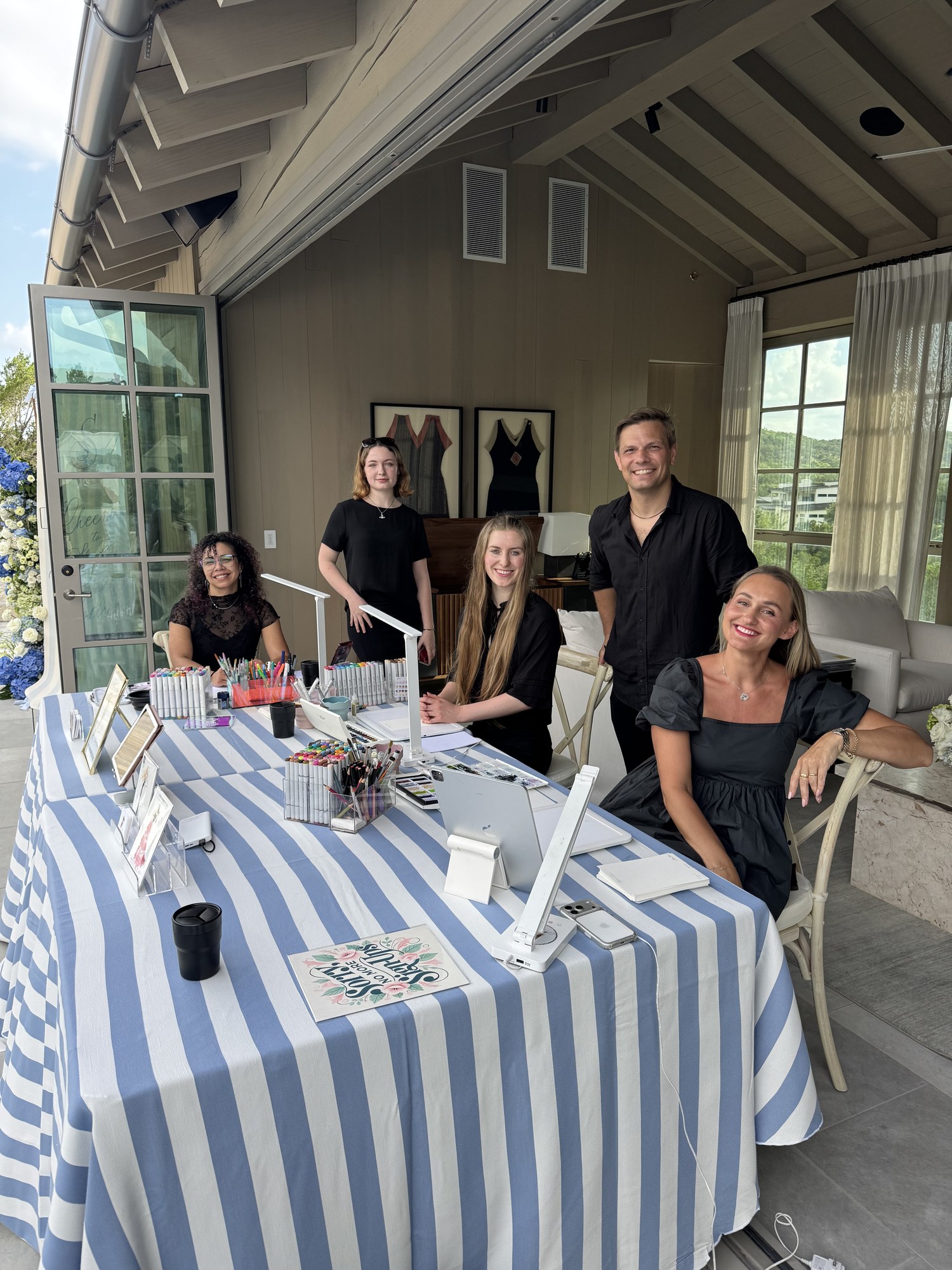 The Alisa Maxime Studio team set up at the event